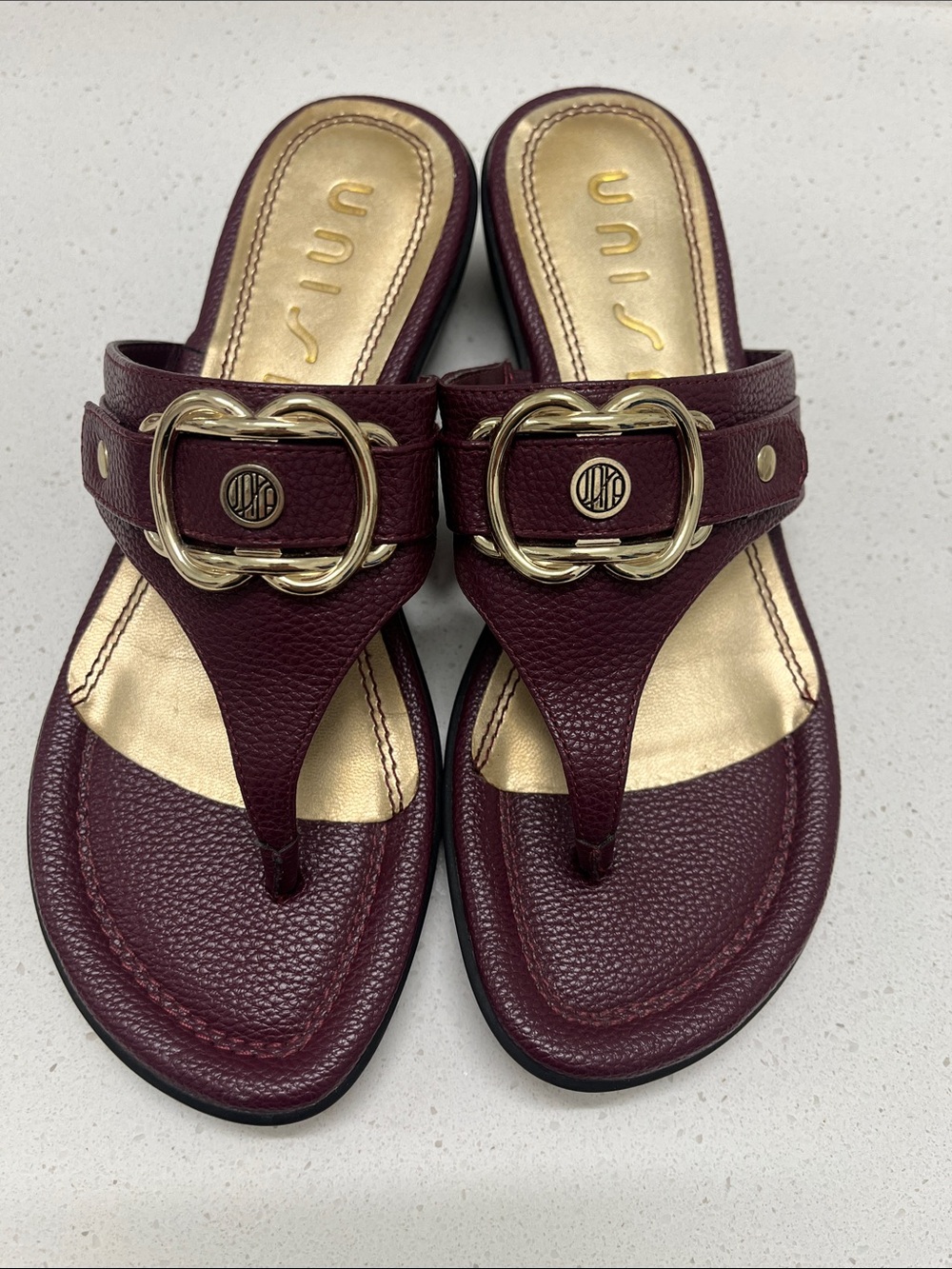 Unisa Women's Burgundy Leather Thong Sandals with Gold Accent Buckle